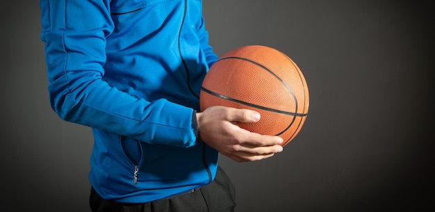 Caucasian man holding basketball ball