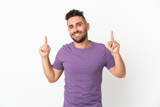 Caucasian man isolated on white background pointing up a great idea