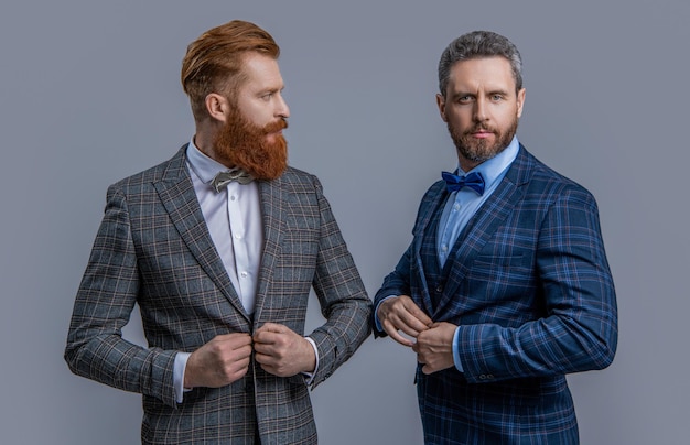 Caucasian men in tuxedo on background photo of men in tuxedo suits men in tuxedo