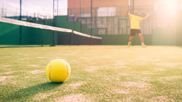 A caucasian padel player jump to the ball good looking for posts and poster