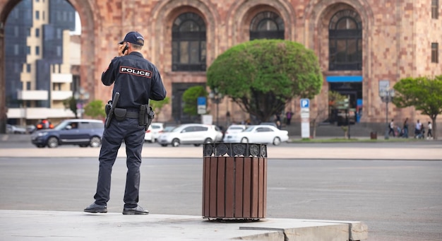 Caucasian police officer in the city