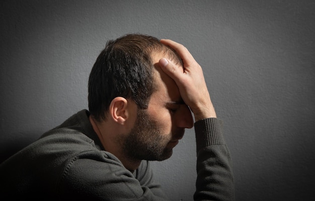 Caucasian stressed man at home