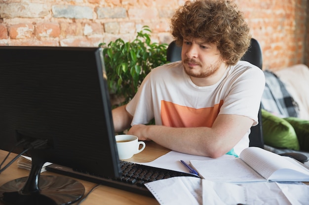 Caucasian upset and despair man watching financial and economical reports