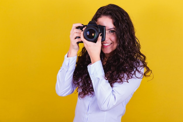 Caucasian woman Brazilian photographer holding photo camera taking pictures Advertising audio visual