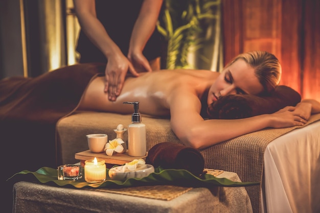 Caucasian woman customer enjoying relaxing antistress massage Quiescent