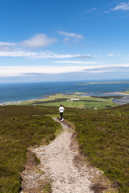 Caucasian woman from Ireland Ireland hiking in nature