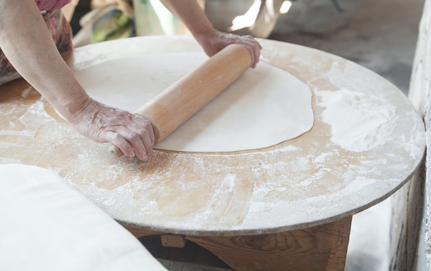 Caucasian woman preparing armenian bread lavash Healthy food