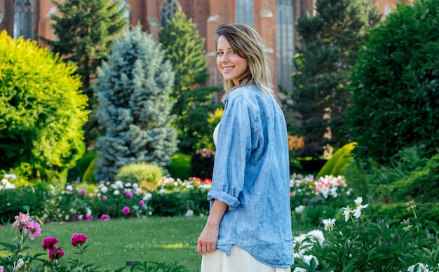 Caucasian young woman in spring time garden