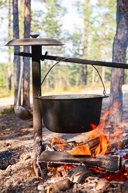 Photo cauldron over campfire