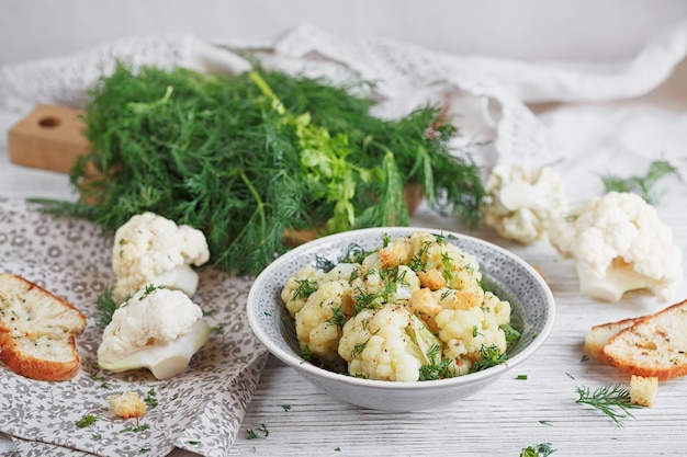 Cauliflower cooked with oil and herbs. Healthy food concept