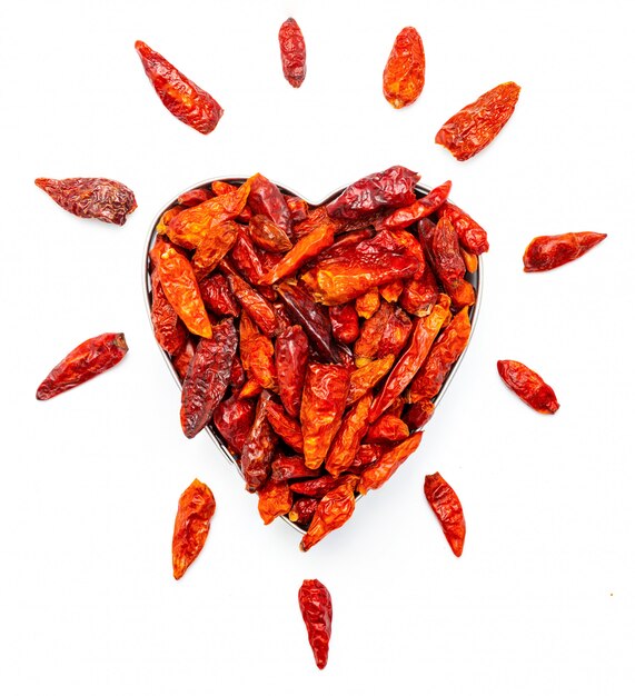 Cayenne chilli in the shape of a heart. For those who love spicy. Passion for the spicy. Love for cayenne pepper. Very spicy spice extracted from the guindillo de Indias