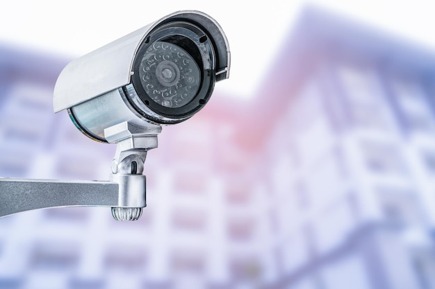 CCTV Closed circuit camera TV monitoring at modern office building construction security system concept