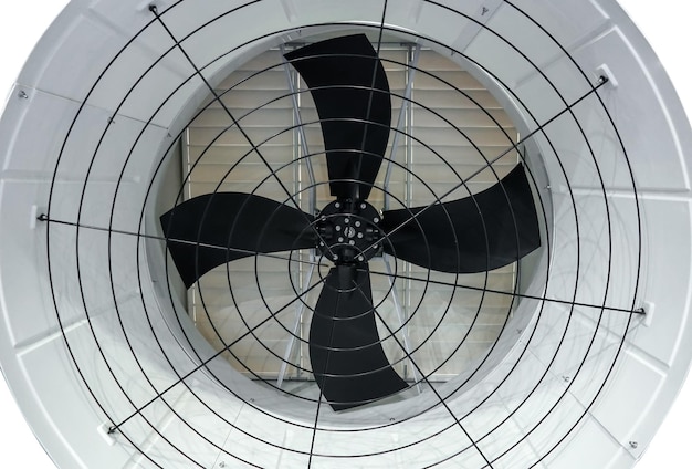 Photo a ceiling fan with a black propeller in a circle.