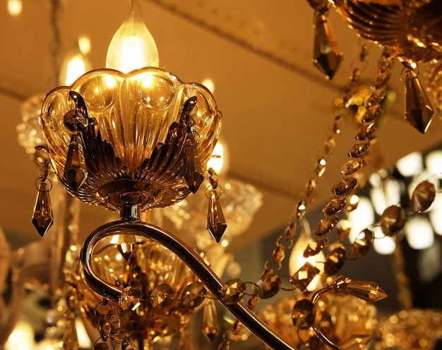 Ceiling lamps chandeliers in the store close up