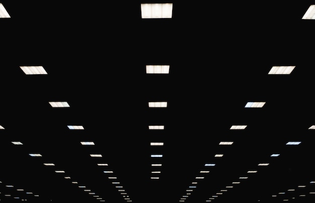 Ceiling with neon lights in aiport. Abstract empty  interior space .