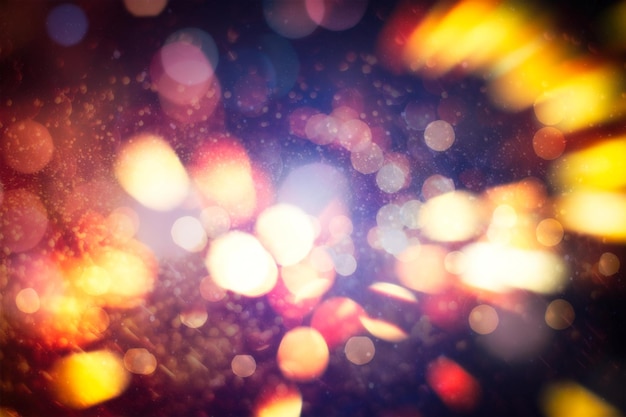 Celebration background with defocused golden lights for Christmas, New Year, Holiday, party