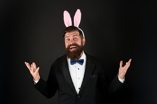 Photo celebration easter holiday. bearded man with long ears. businessman with long ears. handsome man wear bunny costume accessory. easter day. event host. celebrate easter. let me be your bunny.