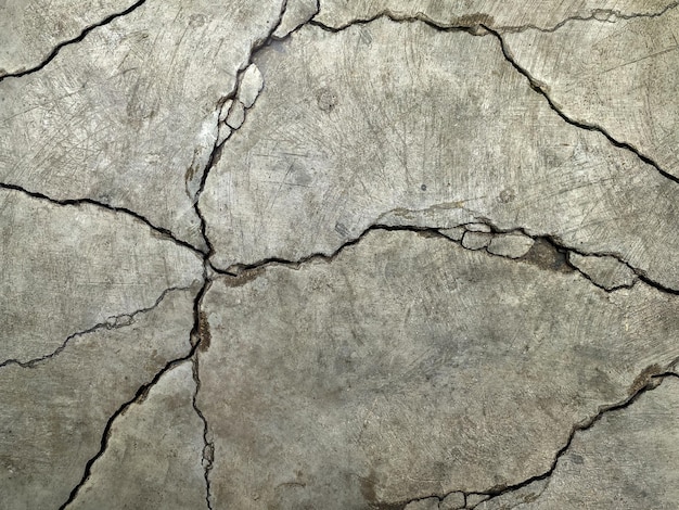 Cement floor with big crack and dirty