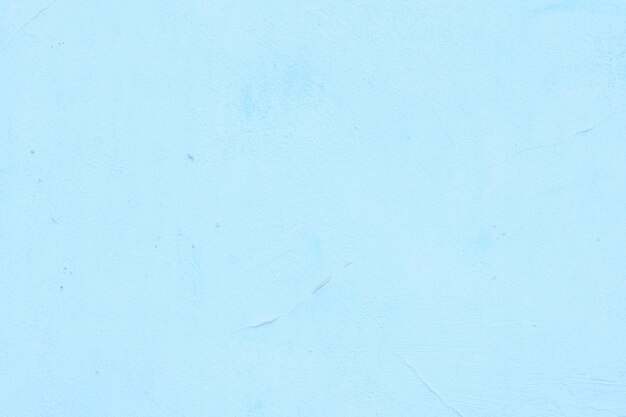 Cement painted wall background babyblue pastel color texture