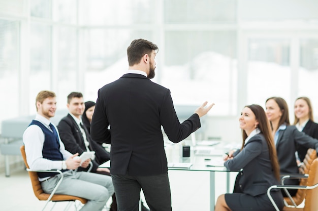 Ceo speaks at the workshop business team in a modern office