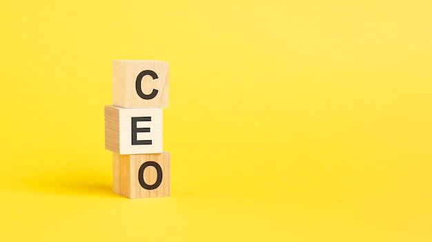 CEO symbol beautiful yellow background business concept copy space