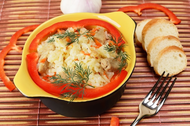 Ceramic bowl with rice pilaf.