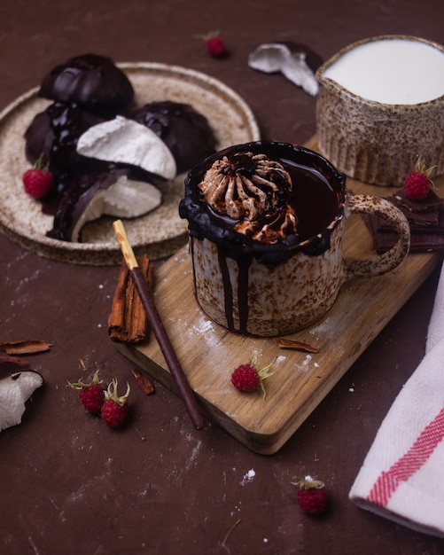 Ceramic cup with chocolate on the table