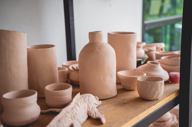 Ceramic vase on the table at the workshop