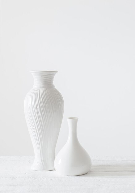 Photo ceramic white vases on white background