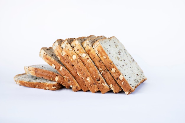 Cereal bread slices on white