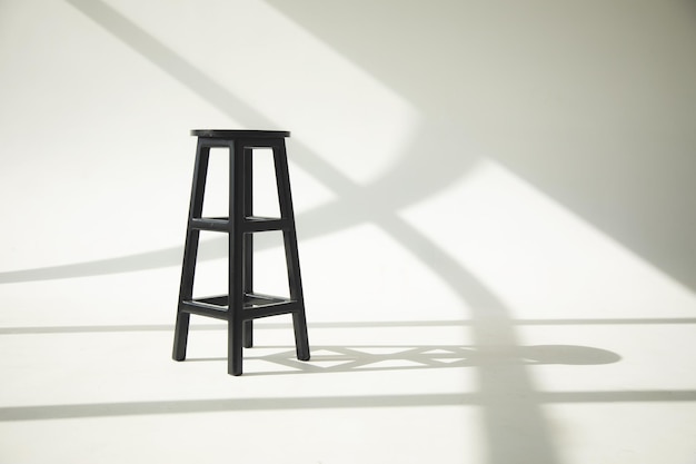 Chair on an empty white studio