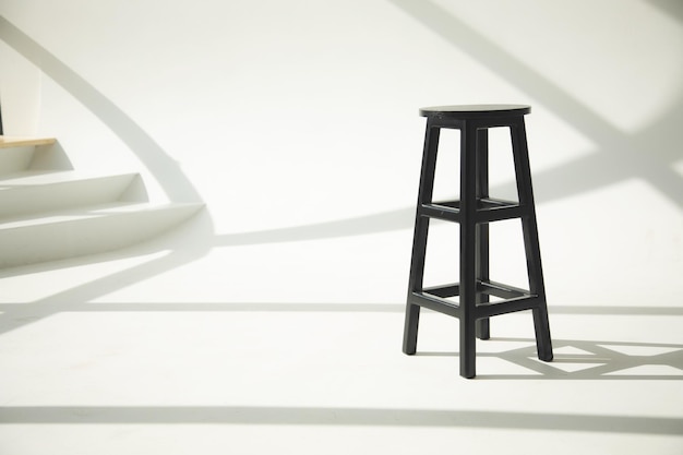 Chair on an empty white studio