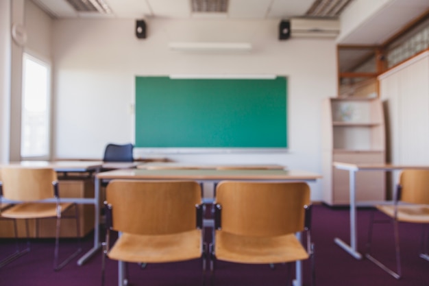 Chairs and blackboard background