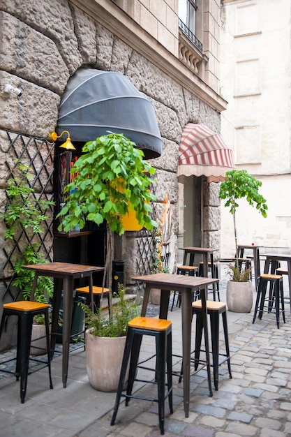 Chairs and table on empty terrace at cafe