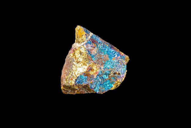 Chalcopyrite isolated on black background. Closeup view