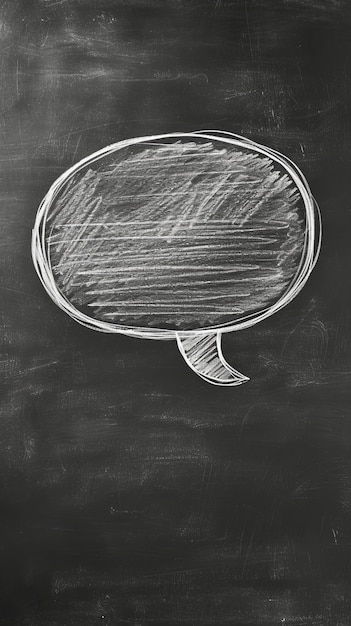 Photo chalk speech bubble on blackboard background communication concept