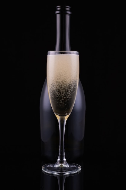 Champagne bottle with champagne glass