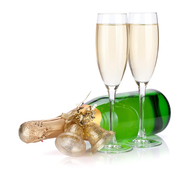 Champagne bottle with christmas decor and two glasses