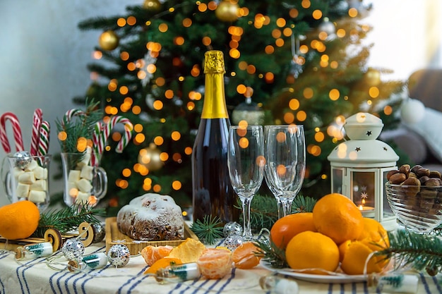 Champagne on the Christmas table Selective focus