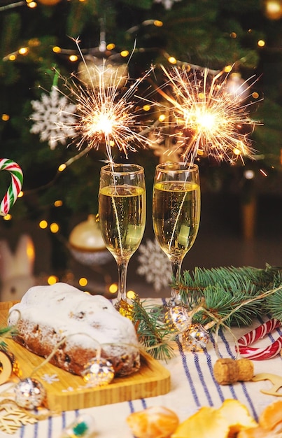 Champagne on the Christmas table Selective focus