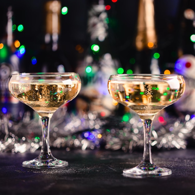 Champagne glasses on a dark background