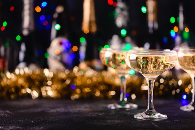 Champagne glasses on a dark background