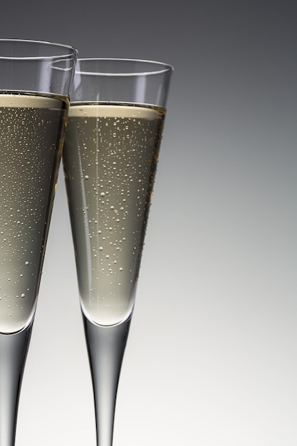 Champagne glasses with condensation drops