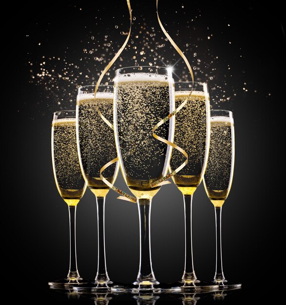 Photo champagne sparkling wine glasses background