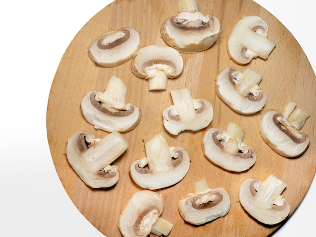 Champignons on a cutting board Kitchen utensils