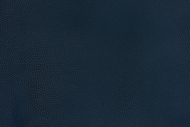 Charcoal textured smooth leather surface background, medium grain