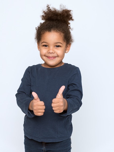 Charming African American child in gray t-shirt 