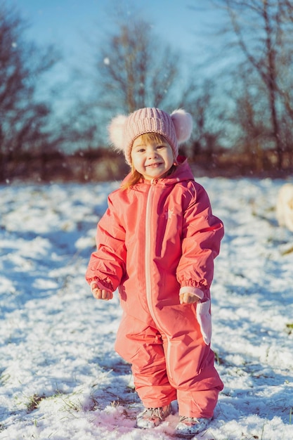 charming beautiful baby walks in winter park