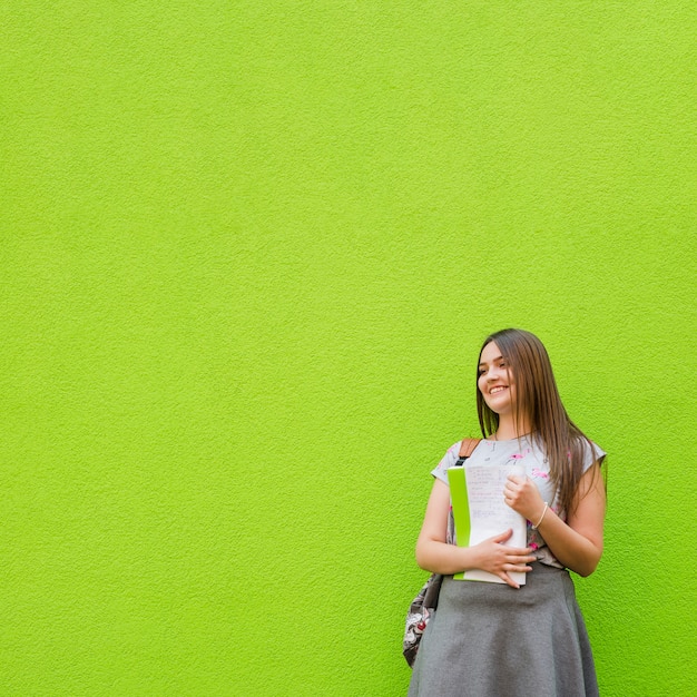 Charming girl with textbook