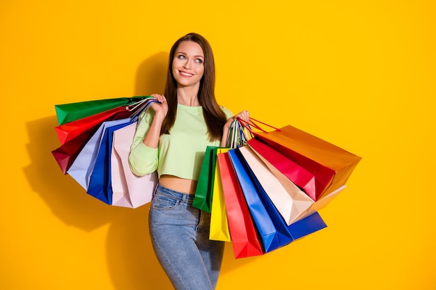 charming lady hold many shopping bags dream look up empty space